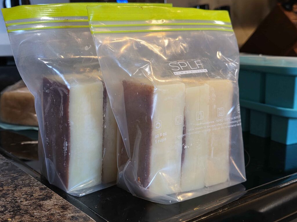 Two reusable quart bags full of hardened butter.