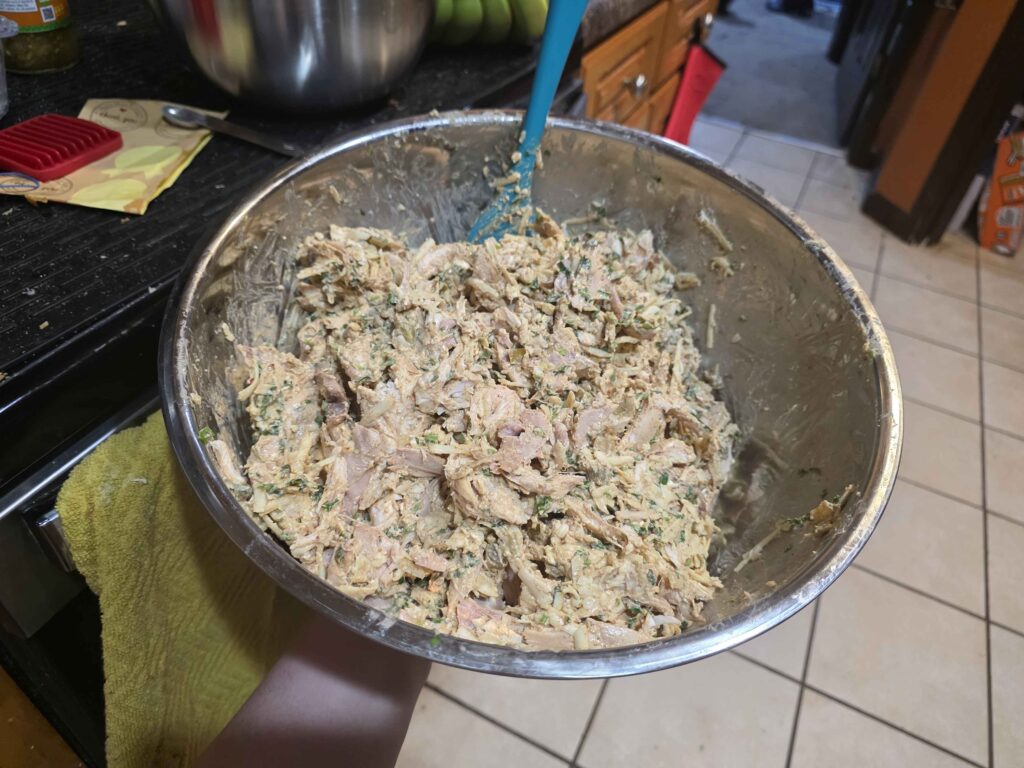 the same giant bowl, now with cream cheese and spices and salsa and chicken in it